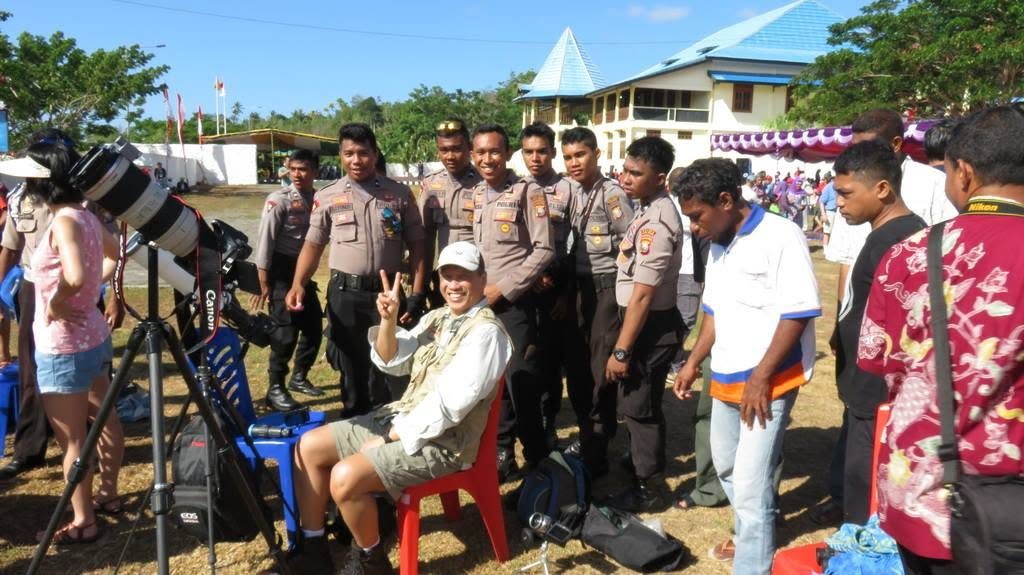 Equipment set up, with locals watching